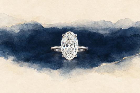 Watercolor of an oval diamond solitaire on a slim white gold band against a navy wash with thin gold lines.