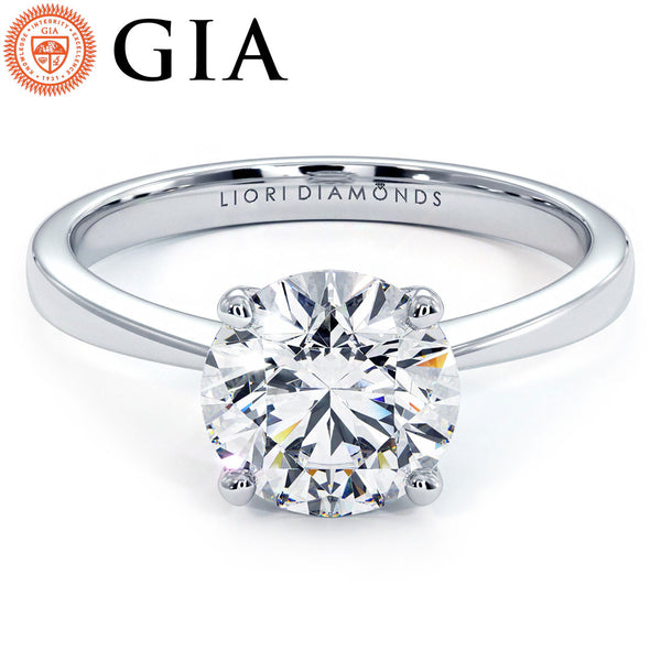 1.5 Carat Round Brilliant Petite Tapered 4 Prong Solitaire