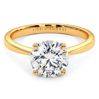 1.5 Carat Round Brilliant Petite Tapered 4 Prong Solitaire