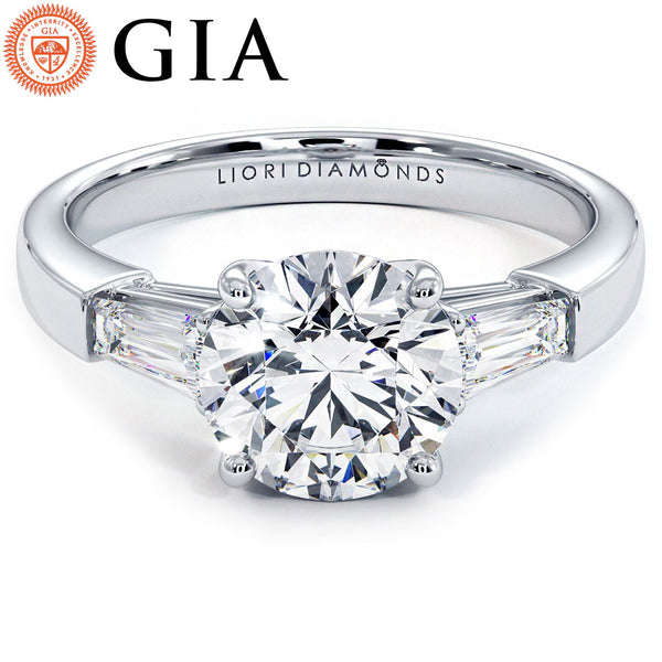 1.5 Carat Round Brilliant Tapered Baguette Three Stone
