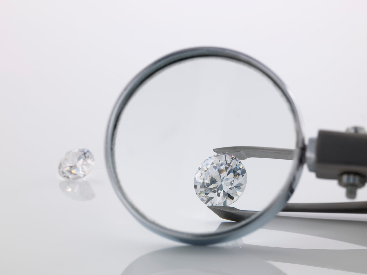 magnifying-glass-over-diamond-2023-11-27-05-35-03-utc.jpg__PID:83138ad1-4450-4376-a20b-deca04555132