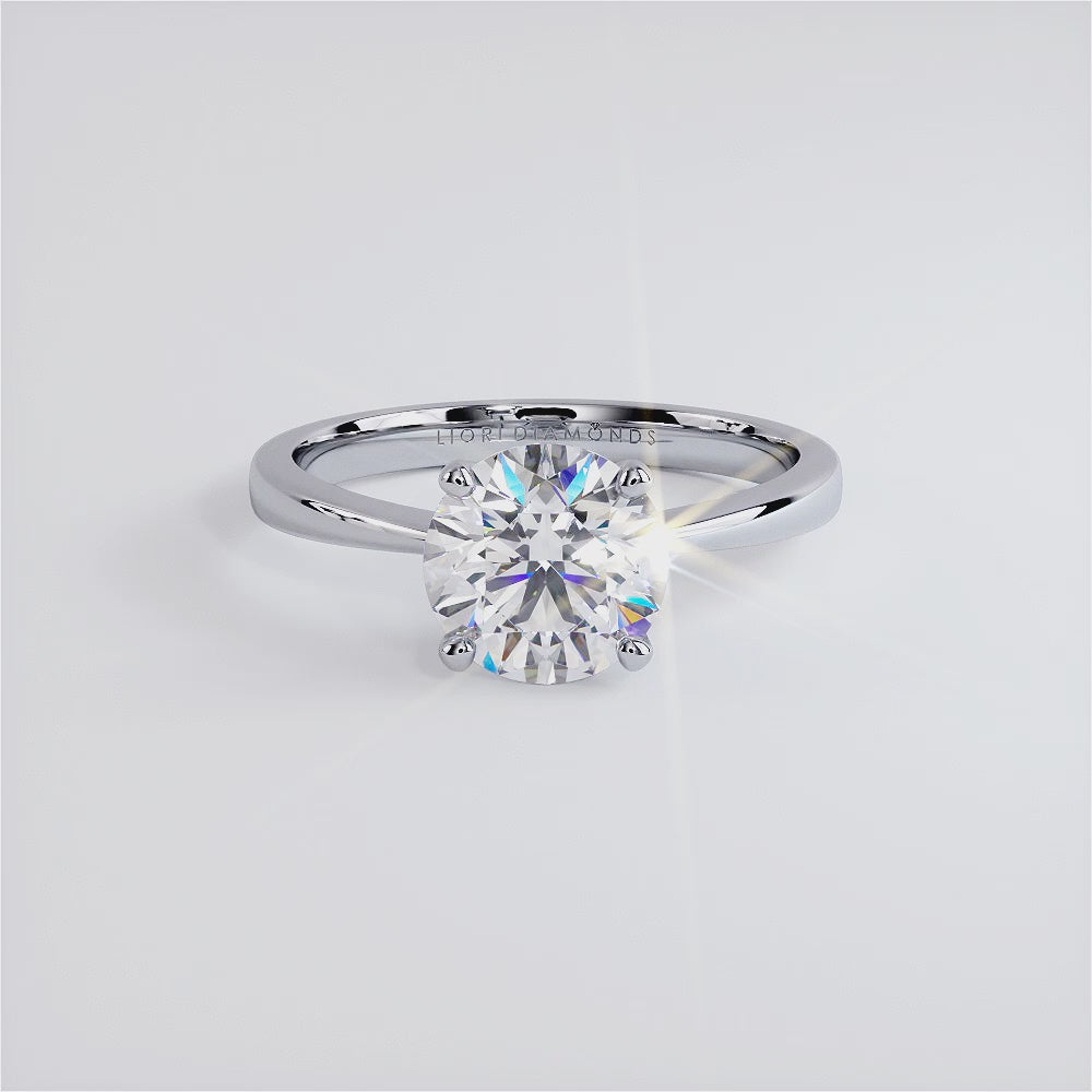 1.5 Carat Round Brilliant Petite Tapered 4 Prong Solitaire