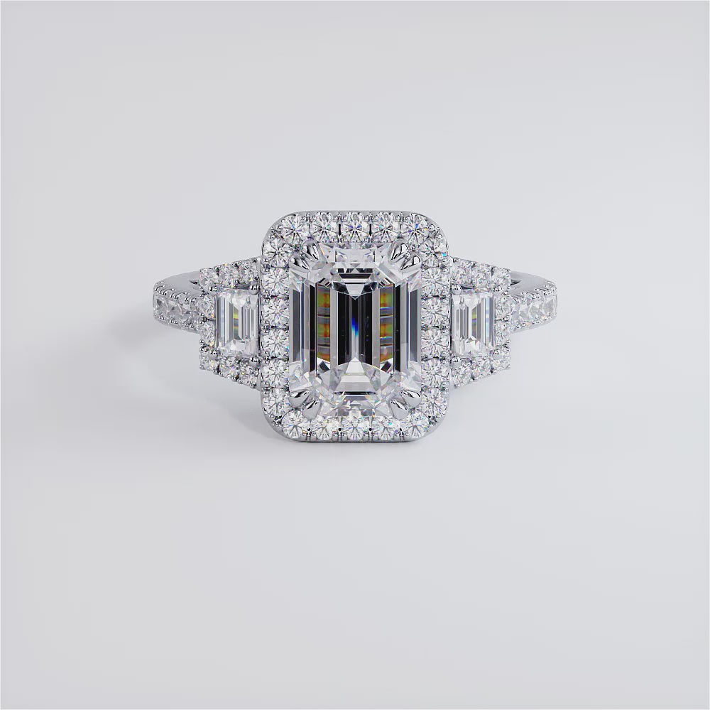 2 Carat Emerald Cut Three Stone Micropavé Halo