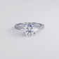 3 Carat Round Brilliant & Tapered Baguette Three Stone Micropavé