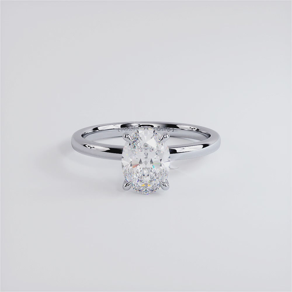 1.50ct GIA Certified Oval Cut Petite Wire Solitaire Lab Grown Diamond Engagement Ring set in 14k White Gold