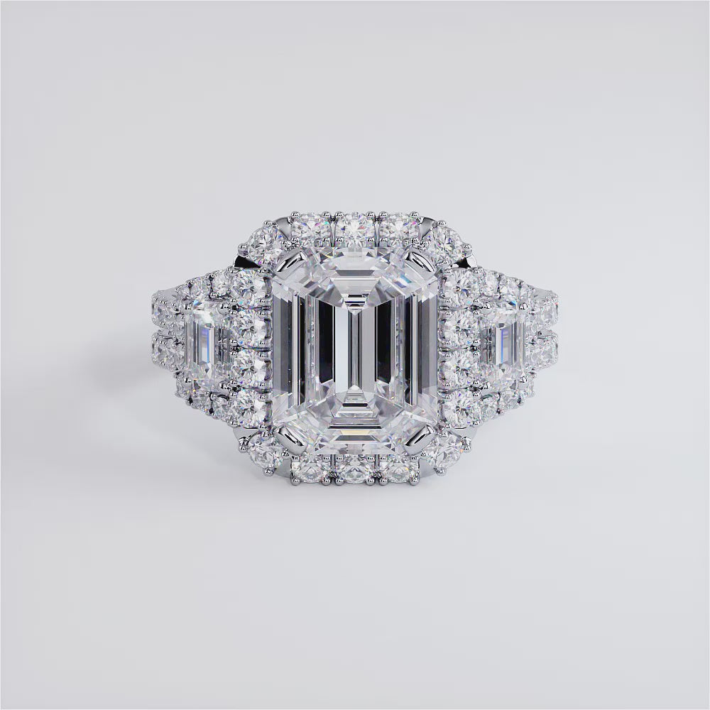 2 Carat Emerald Cut Three Stone Micropavé Halo