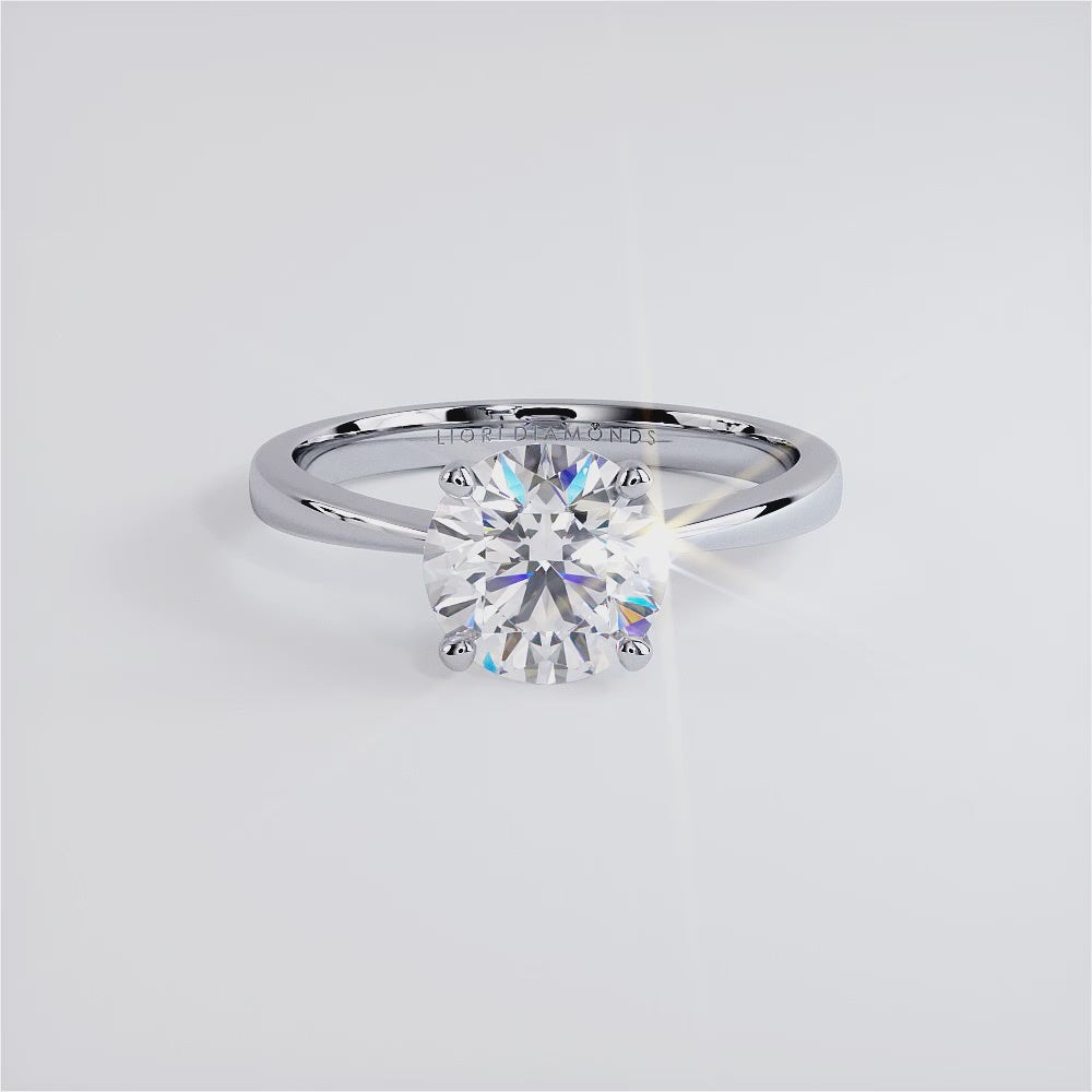 1.5 Carat Round Brilliant Petite Tapered 4 Prong Solitaire