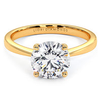 1.50ct Round Brilliant Petite Tapered 4 Prong Solitaire Lab Grown Diamond Engagement Ring set in 14k Yellow Gold