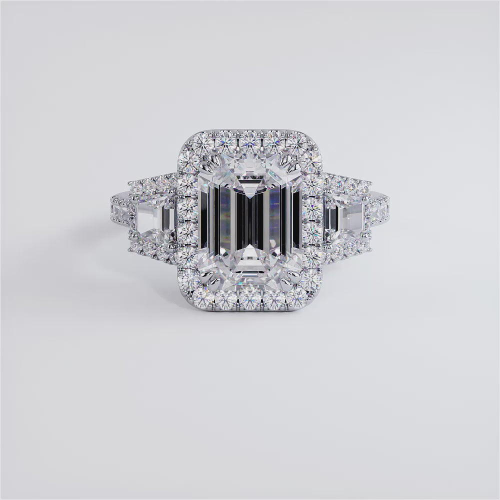 2.5 Carat Emerald Cut Three Stone Micropavé Halo