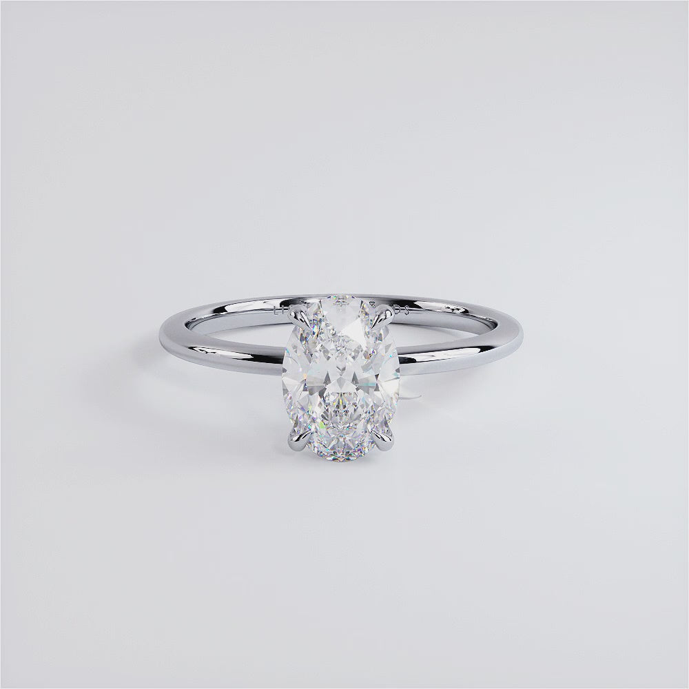 1.5 Carat Oval Cut Petite Wire Basket Solitaire