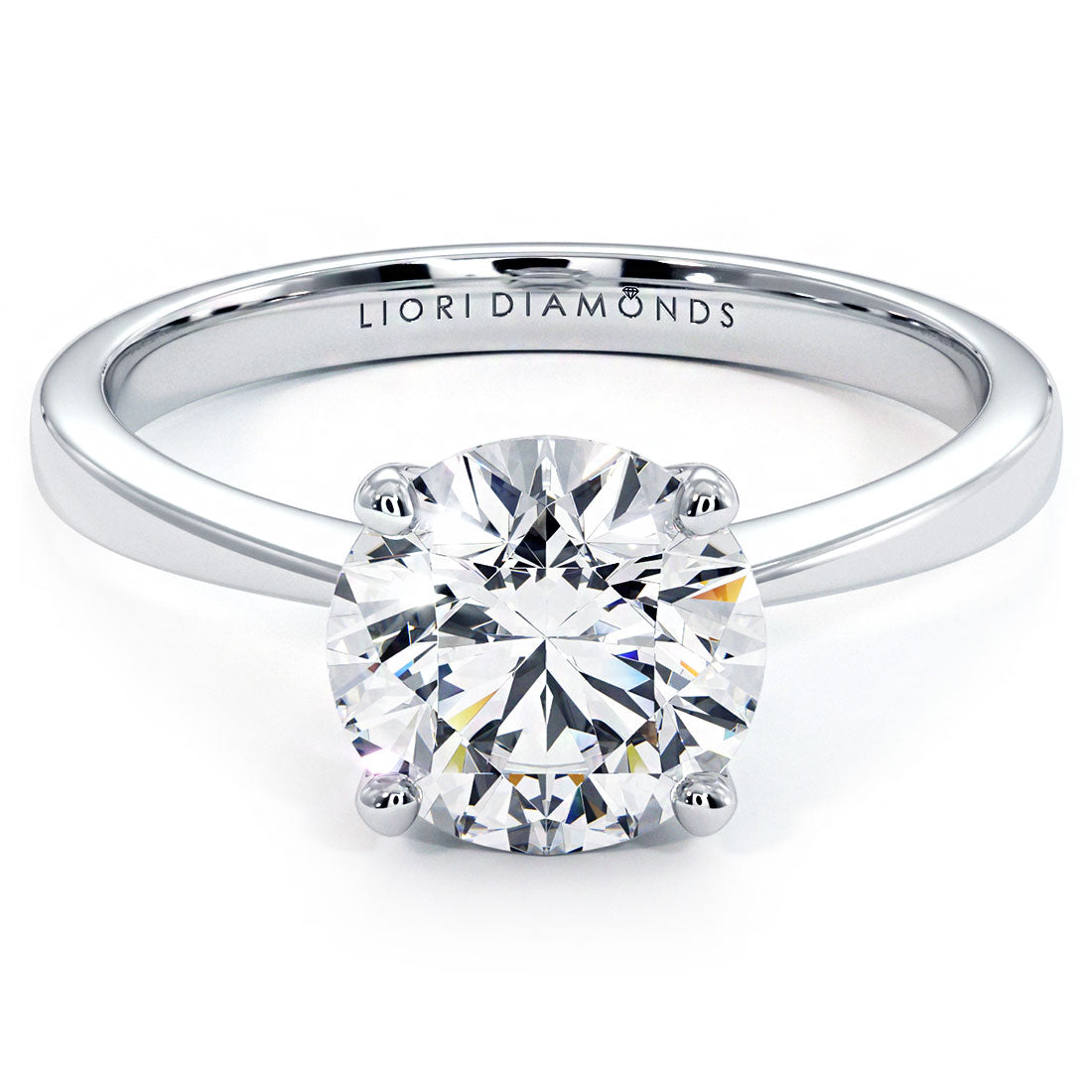 1.5 Carat Round Brilliant Petite Tapered 4 Prong Solitaire