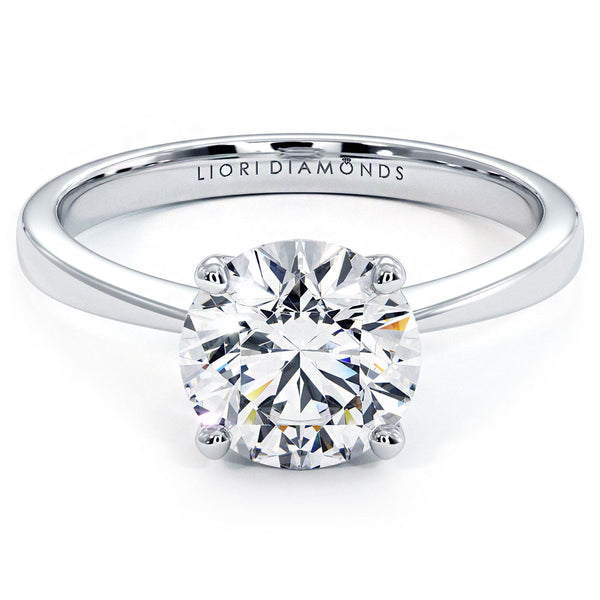 1.5 Carat Round Brilliant Petite Tapered 4 Prong Solitaire