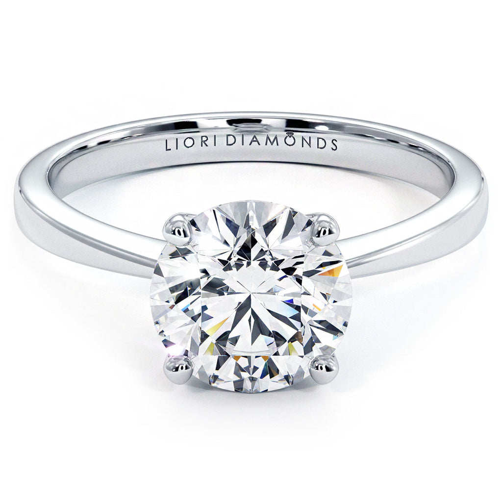 1.5 Carat Round Brilliant Petite Tapered 4 Prong Solitaire