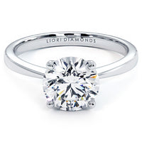 1.5 Carat Round Brilliant Petite Tapered 4 Prong Solitaire