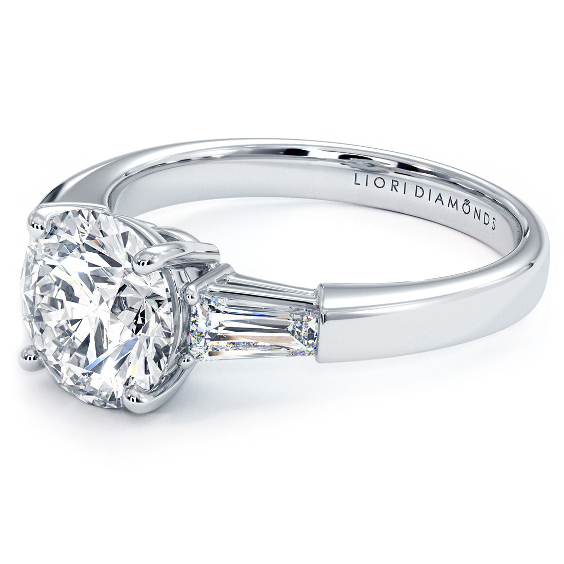 1.5 Carat Round Brilliant Tapered Baguette Three Stone