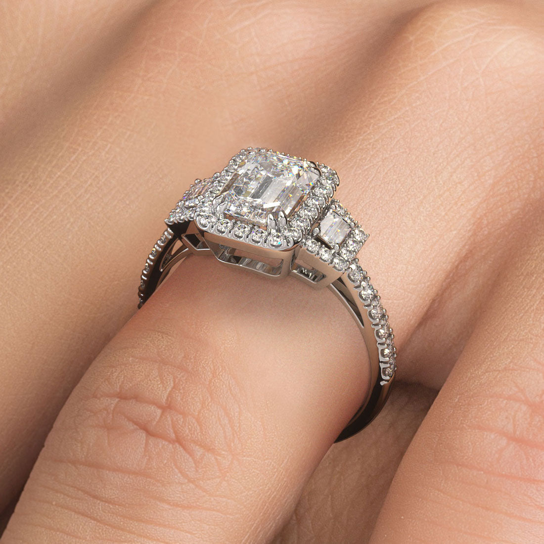 1.5 Carat Emerald Cut Three Stone Micropavé Halo