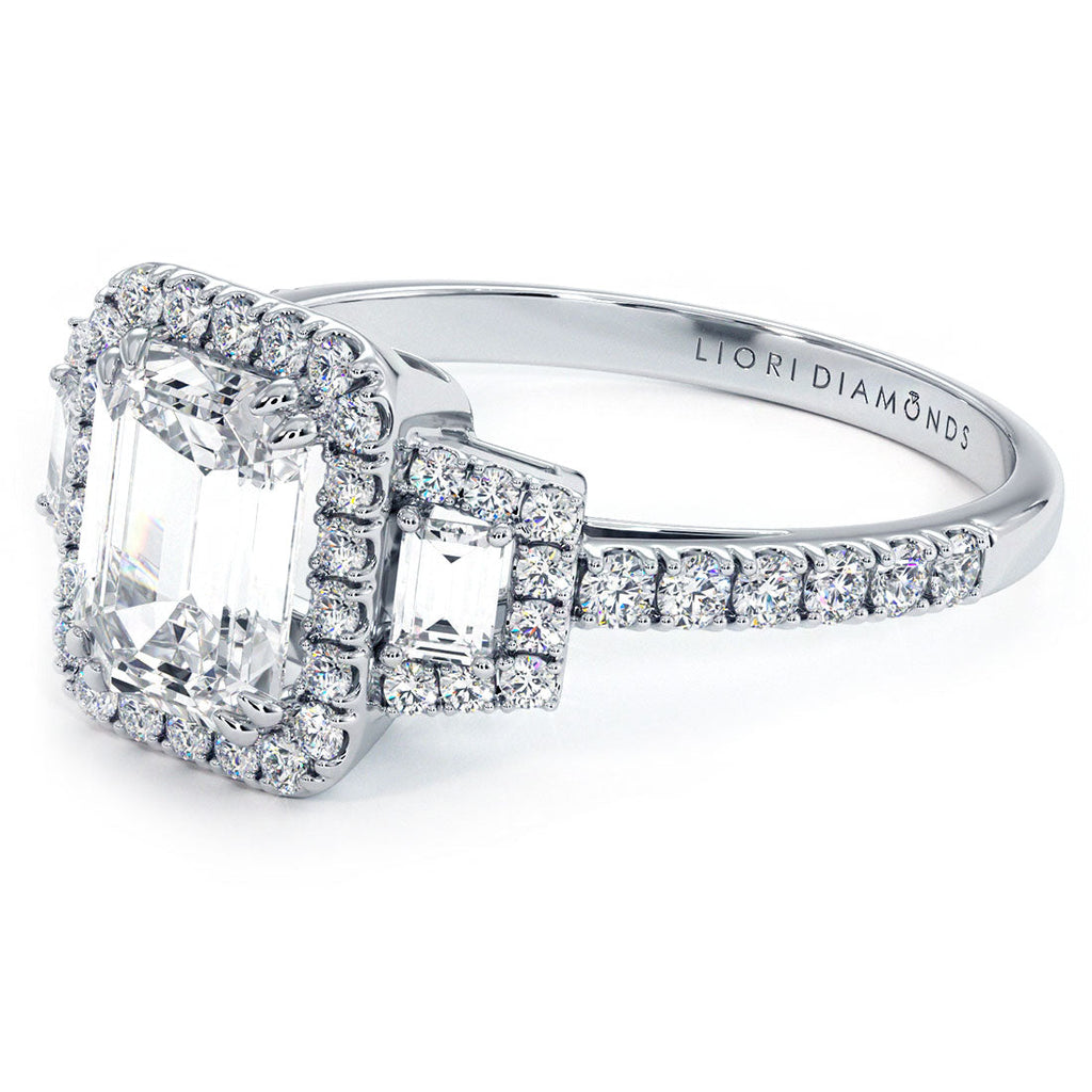 1.5 Carat Emerald Cut Three Stone Micropavé Halo