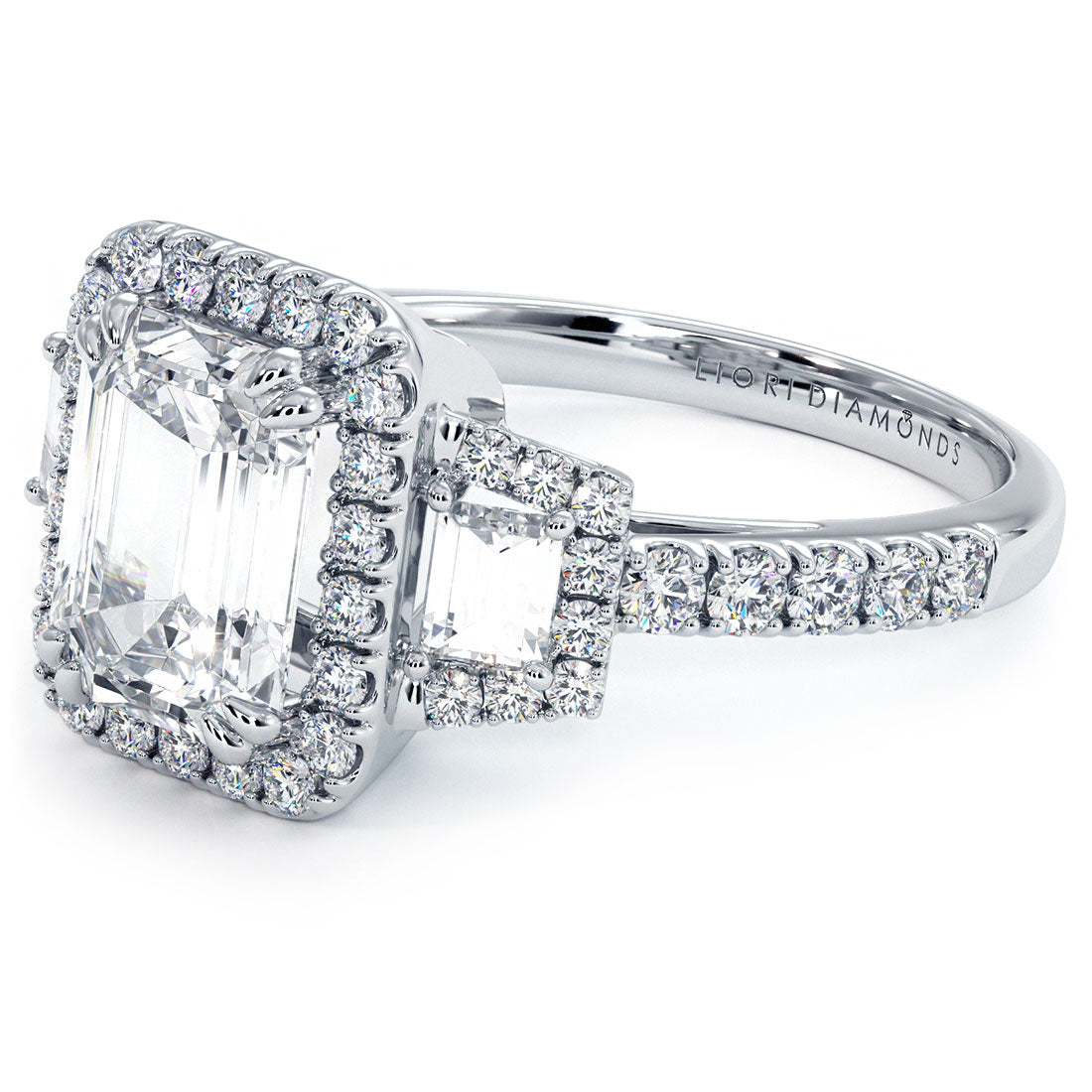 2 Carat Emerald Cut Three Stone Micropavé Halo