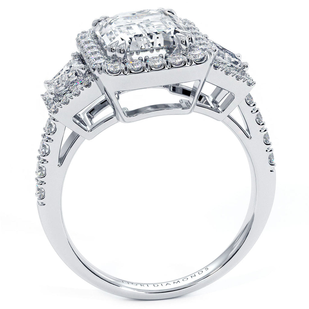 2.5 Carat Emerald Cut Three Stone Micropavé Halo