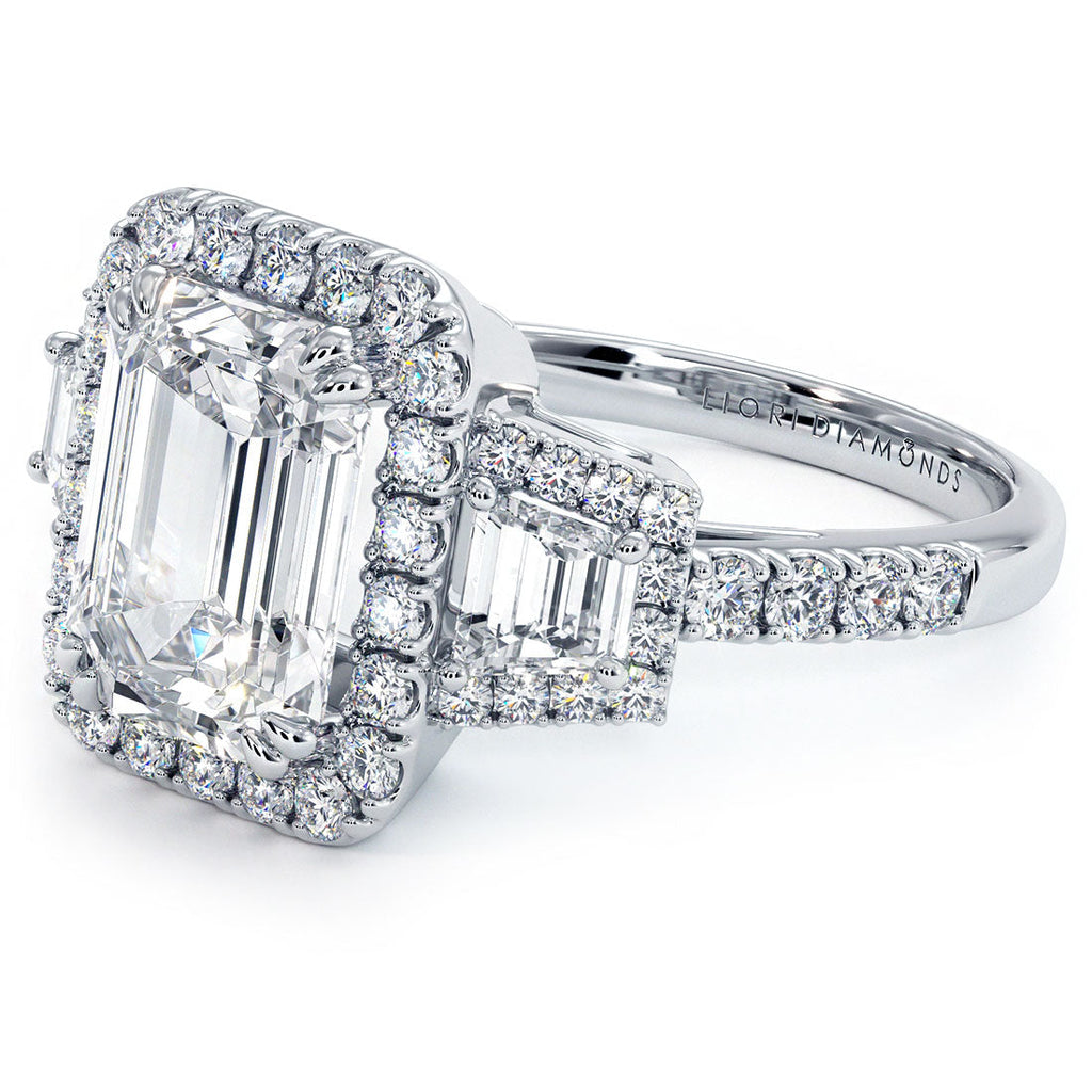 2.5 Carat Emerald Cut Three Stone Micropavé Halo