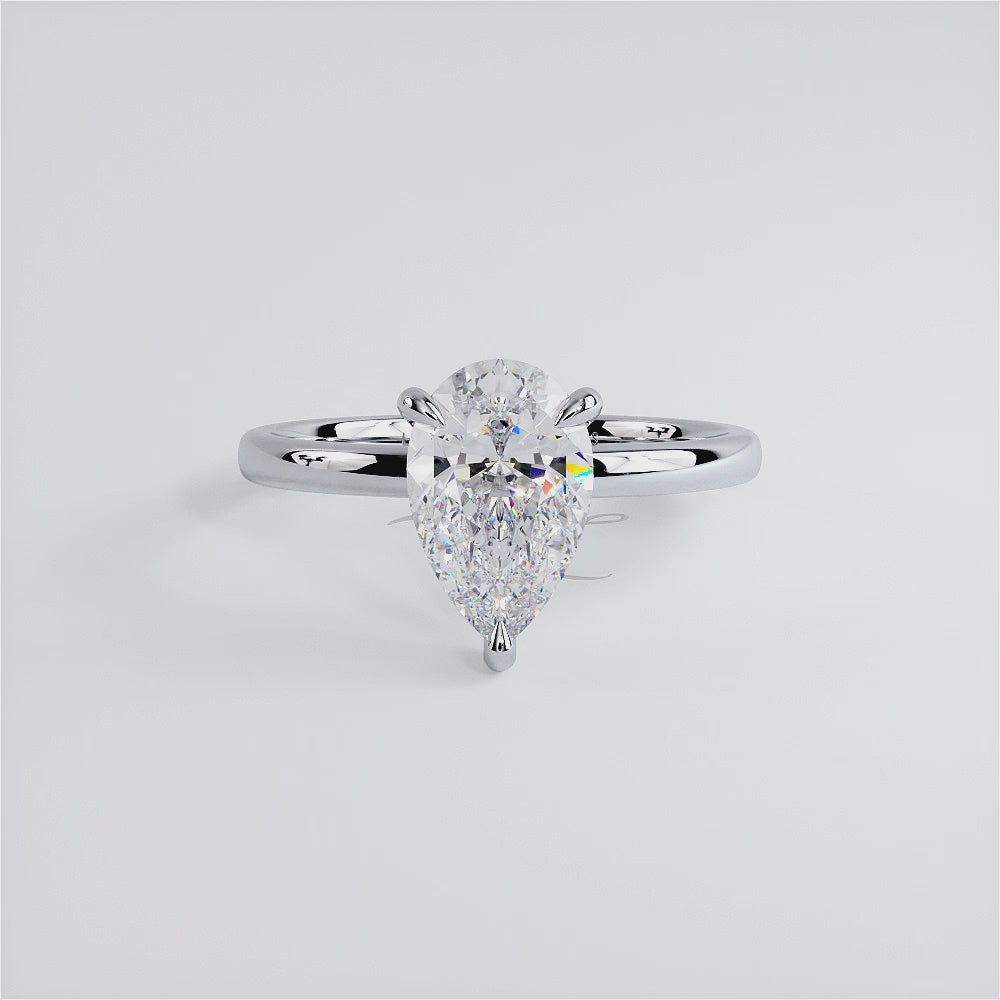 1.5 Carat Pear Shape Petite Wire Basket Solitaire